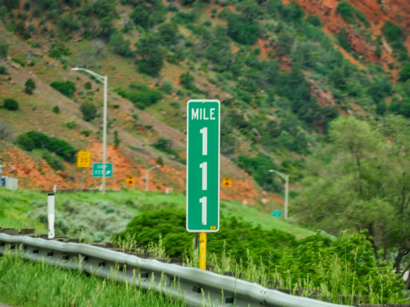 green highway road sign