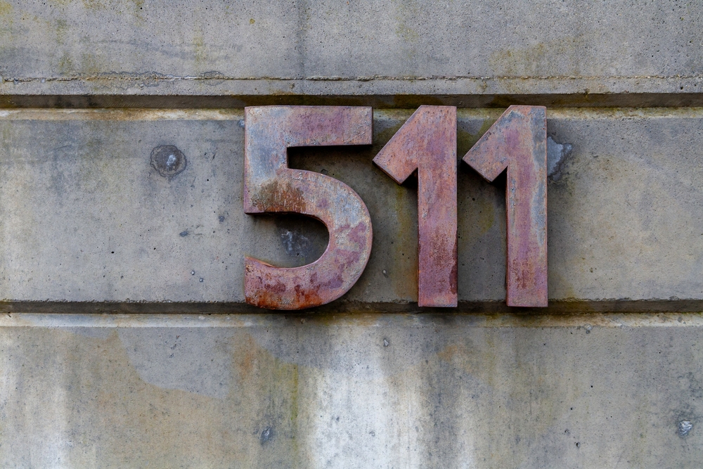 A close up shot of an aged metal 511